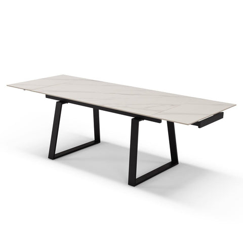 Tavolo con top in grès ceramico effetto marmo allungabile e struttura in metallo