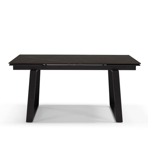 Tavolo con top in grès ceramico effetto pietra nera e struttura in metallo