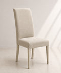 Sedia imbottita moderna color beige con gambe in legno e tessuto sfoderabile