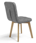 Sedia imbottita con gambe in legno