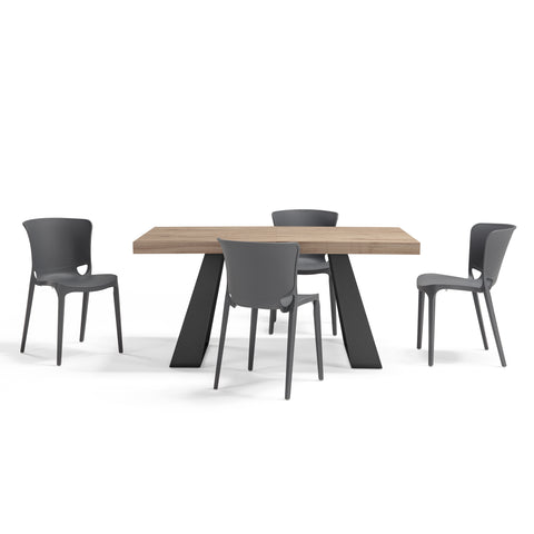 Tavolo con top in legno effetto noce e gambe in metallo con sedie in polipropilene