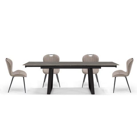 Tavolo con top in grès ceramico effetto pietra grigia allungabile e struttura in metallo con sedie imbottite e gambe in metallo