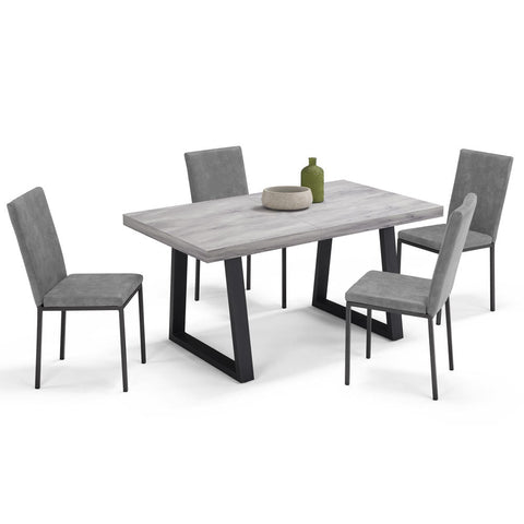 Tavolo con top in legno effetto cemento con gambe in metallo e sedie imbottite con gambe in metallo