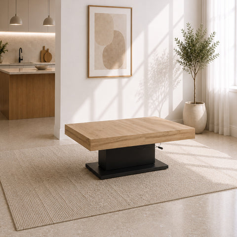 Tavolo trasformabile Apollo con piano in finitura Quercia e basamento centrale in metallo antracite. Dotato di meccanismo regolabile in altezza e piano allungabile, si trasforma da tavolino da salotto a tavolo da pranzo, ideale per ottimizzare gli spazi.
